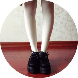New black suede platform shoes